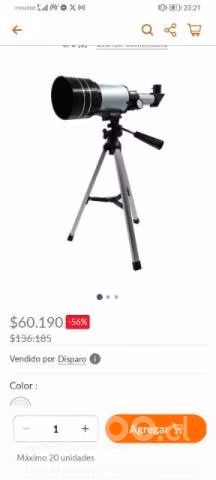 Telescopio con libro atlas del universo