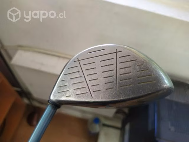 Dos palos de golf+ 5 pelotas de golf