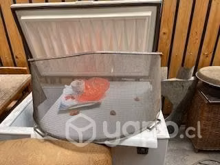 Chimenea, tubos, cobre martillado, leños ceramicos