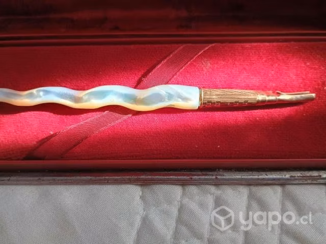 Pluma enchapada en oro