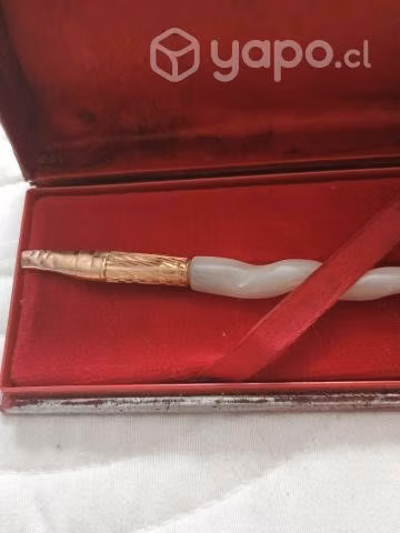 Pluma enchapada en oro