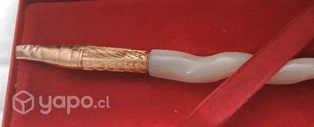 Pluma enchapada en oro