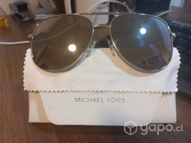 Lente Michael Kords Dorado