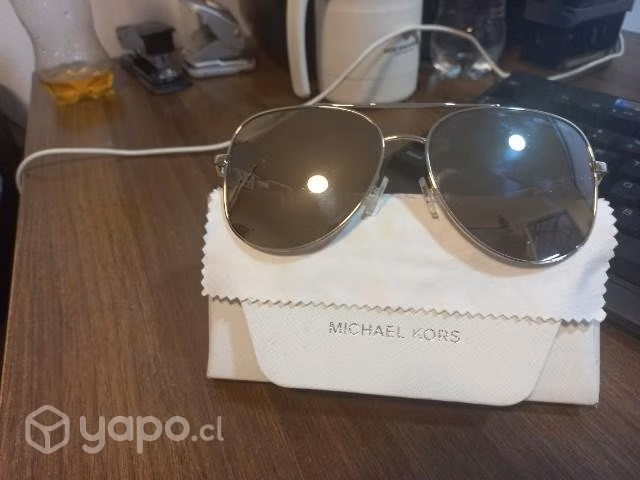 Lente Michael Kords Dorado