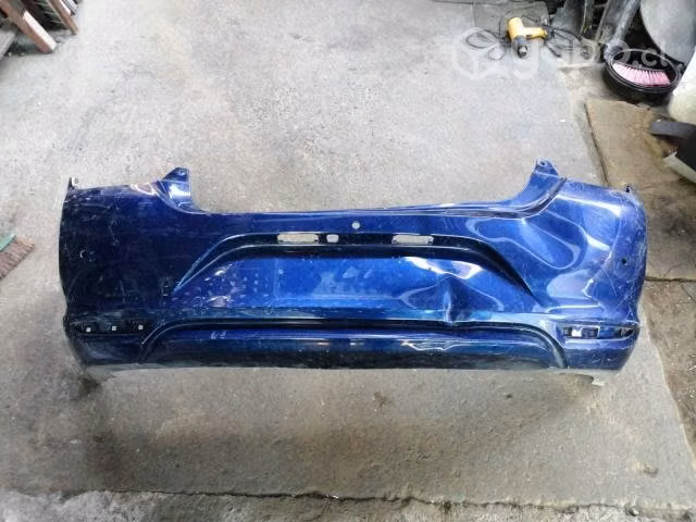 Parachoque trasero nissan new versa 2021-2022 orig