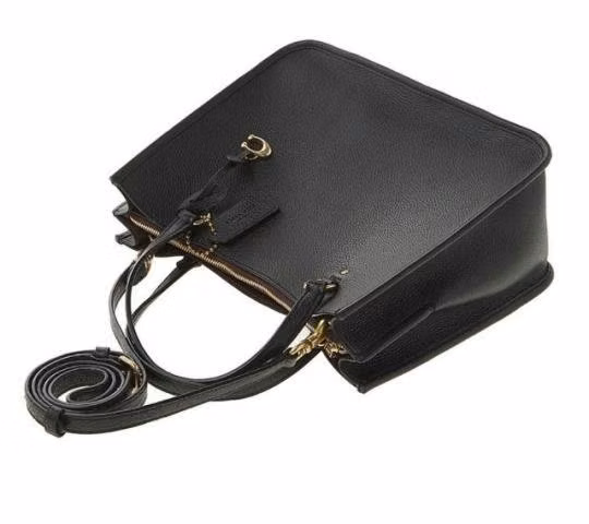 Cartera Coach Nueva sin uso 100% cuero
