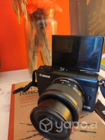 Canon m100 + cargador + bateria + kit lens