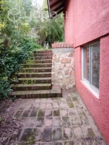 Vendo terreno con casa construida