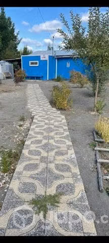 Terreno que incluye casa y galpon