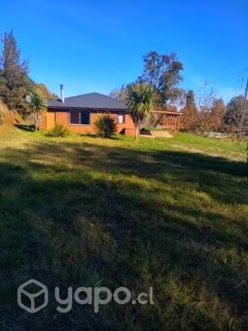 Vendo parcela 5000m2 con casa y quincho