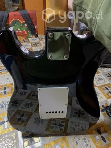 Guitarra eléctrica con amplificador Freeman