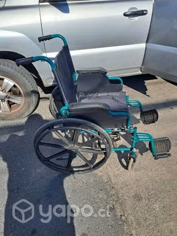 Silla de ruedas impecable