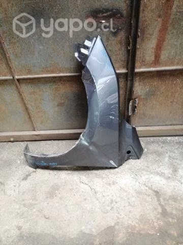 Tapabarro izquierdo nissan new versa original