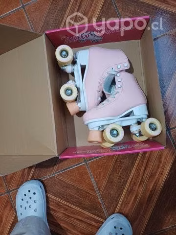 Patines rosas en muy buen estado
