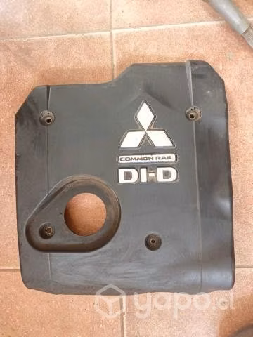 Tapa motor Alzavidrio Mitsubishi L200 Año 07-15