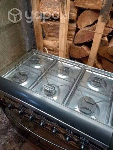 Cocina gas 6 platos semi nueva