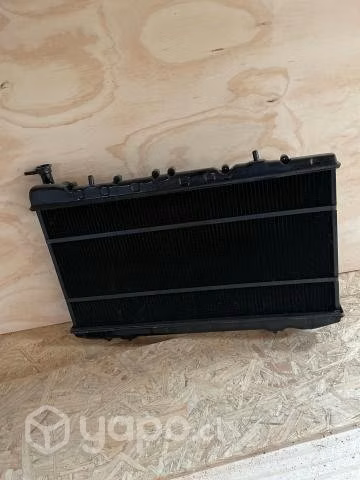 Radiador metálico Nissan V16