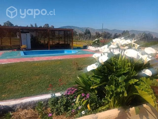 Vende parcela construida 2 casas + piscina