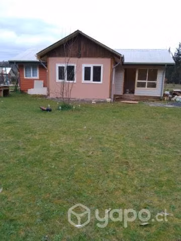 Terreno con casa