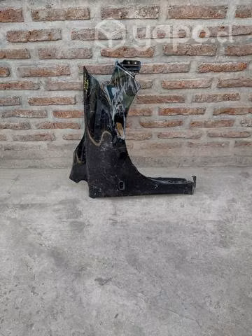 Tapa barro Nissan tida $