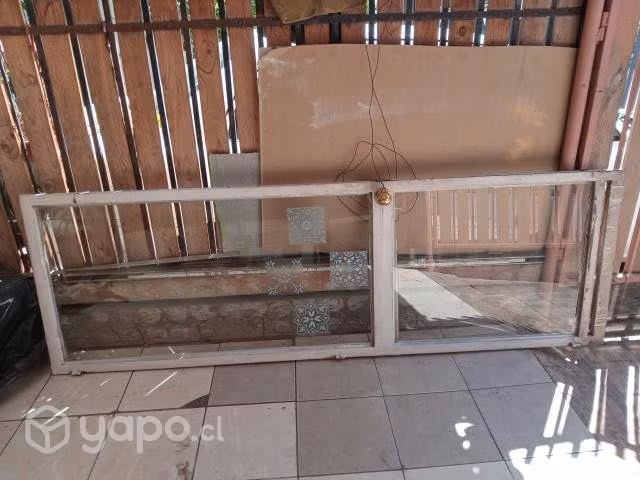 Puerta vidriada de fierro