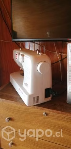 Maquina de cocer singer