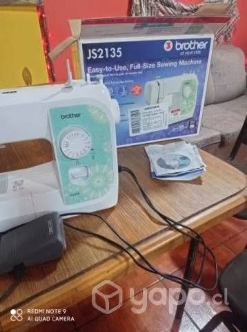Maquina de coser impecable