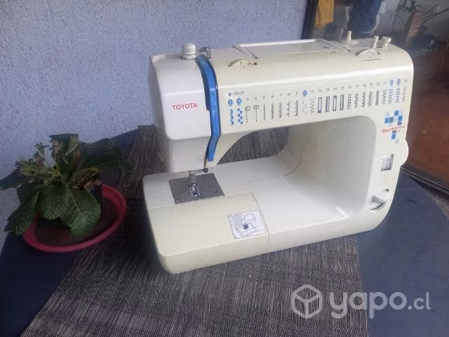 Maquina de coser portátil marca toyota