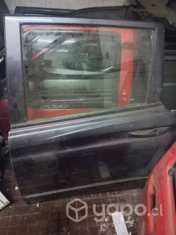 Puerta trasera izquierda samgyon actyon 2016