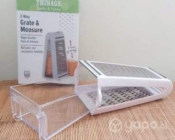 Rallador de acero inoxidable con recipiente