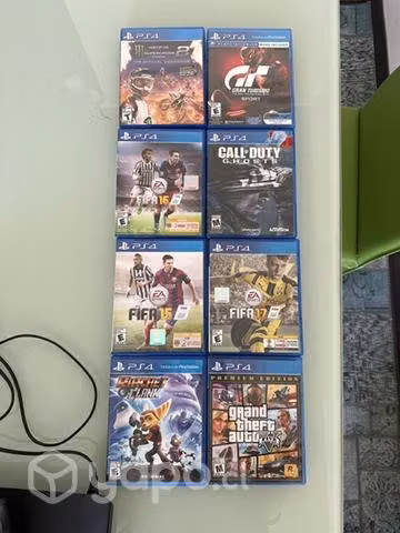 PlayStation 4 + 2 controles y 8 juegos