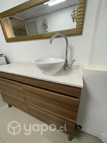 Mueble con lavamanos y llave mármol