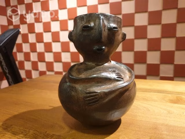 Escultura mapuche quetro