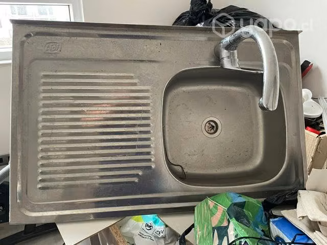 Lavaplatos nuevo y completo con llave y sifón