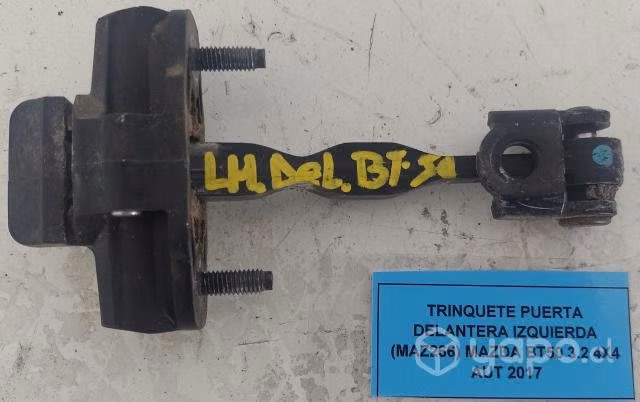 Trinquete Puerta Delantera Izquierda (MAZ266) Mazd