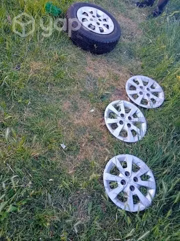 4 neumaticos con sus llantas y a parte 4 tapa - Imagen 3