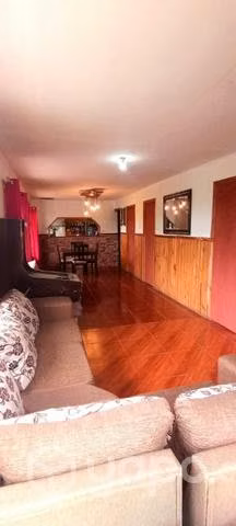 Terreno con casa