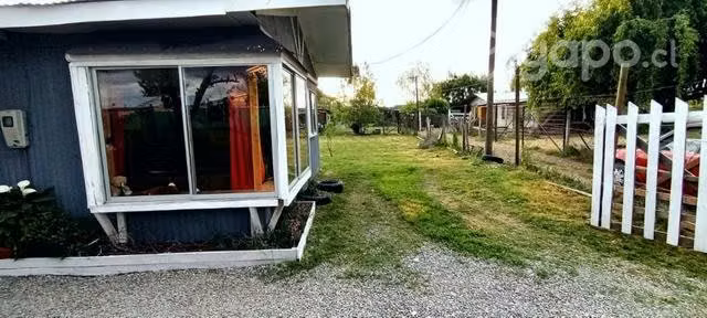 Terreno con casa