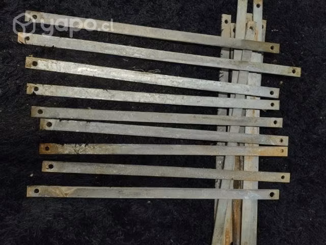 Pletinas de fierro dos agujeros