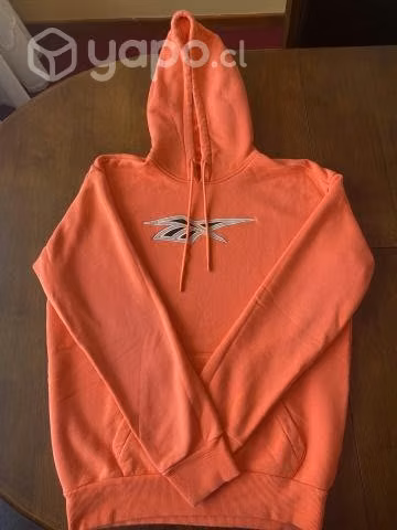 Poleron naranjo reebok