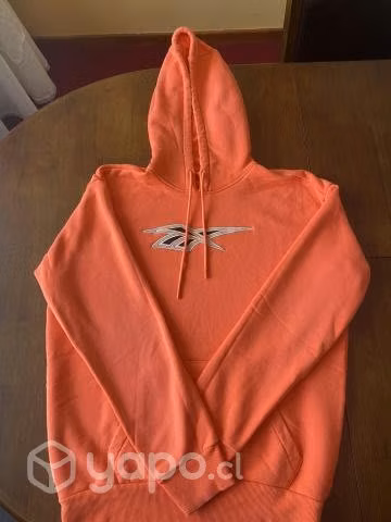 Poleron naranjo reebok