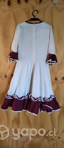 Vestido de huasa con el falso y caporal