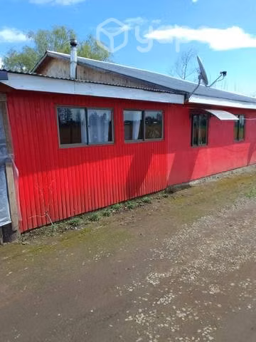 Terreno con casa y cabaña incluida