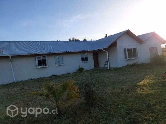 Parcela con casa