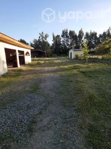 Parcela con casa