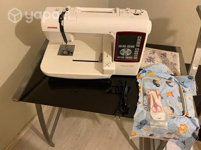 Máquina bordadora Janome Memory craft 203E