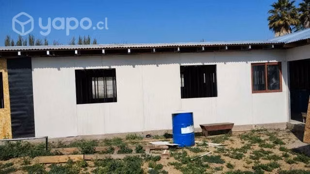 Terreno con casa en construcción