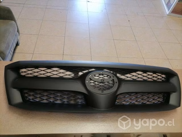 Mascara hilux + logo cromado