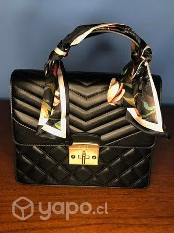 Bolso de mano guess y Aldo