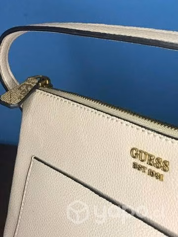 Bolso de mano guess y Aldo